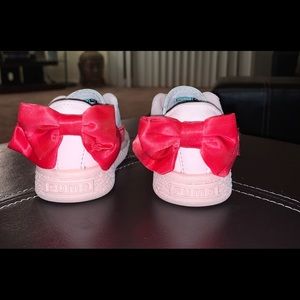 4c infant , light pink with dark pink silk bow